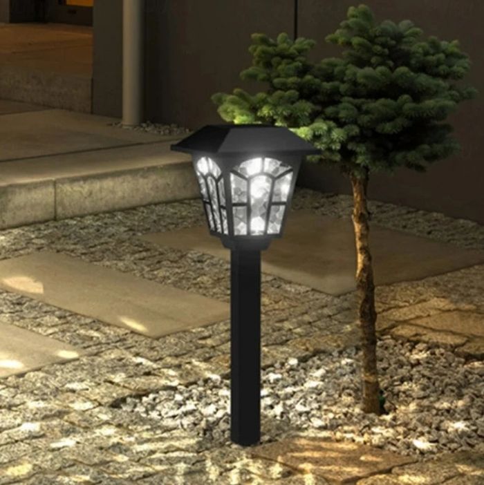 Set de 4 Lămpi Solare Decorative pentru Grădină cu Proiectie de Licurici – Eleganță și Autonomie de 8 Ore